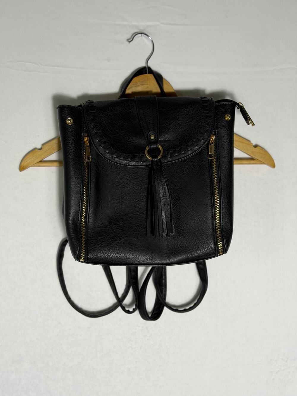 Black Faux Leather Backpack Purse Leopard Print Lining Gold Hardware Tassel